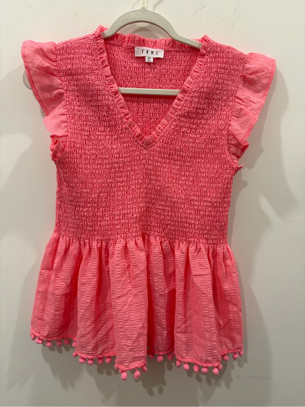 THML Pink Smocked V-Neck Pom-Pom Peplum Top